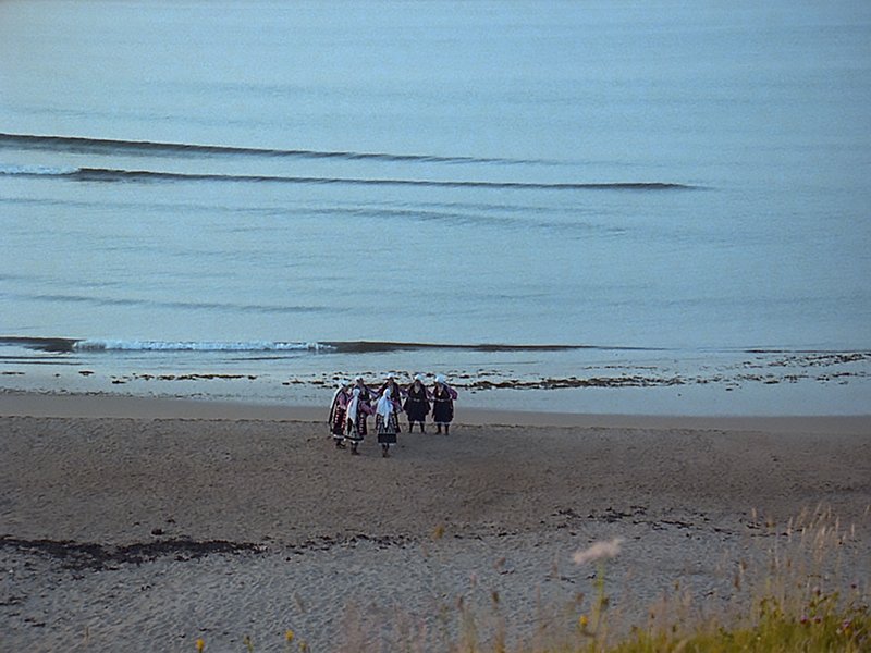Image: The Bistritsa Babi in A Work for the North Sea by Bethan Huws, performed on Sugar Sands, Northumberland, July 1993. Photograph: © Bethan Huws  