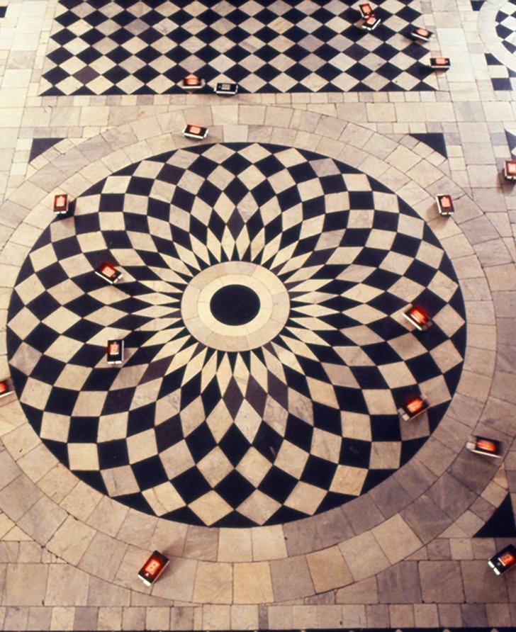 Red digital counters move across the black and white tiled floor of the Great Hall of the Queen's House in Greenwich, London. Running Time (1995) by Tatsuo Miyajima. Photograph: Stephen White