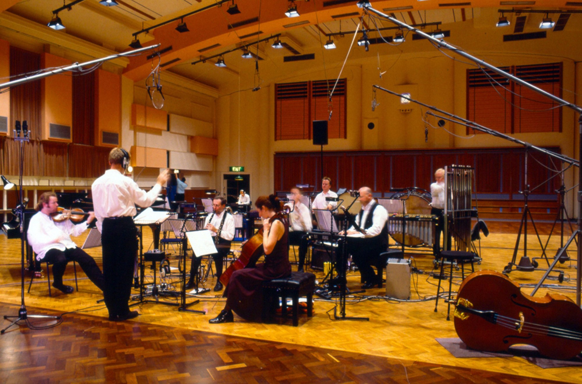 The Gavin Bryars Ensemble performing A Man in a Room, Gambling by Gavin Bryars and Juan Muñoz at the BBC Maida Vale Studios, London, 1997. Photograph: Steven White