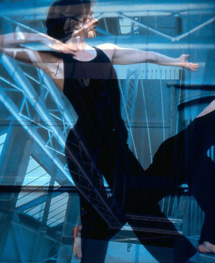 Image: A double exposure of a Deborah Bull and another (unidentifiable) dancer performing in the Atlantis Building, London, Photograph: Sarah Ainslie 