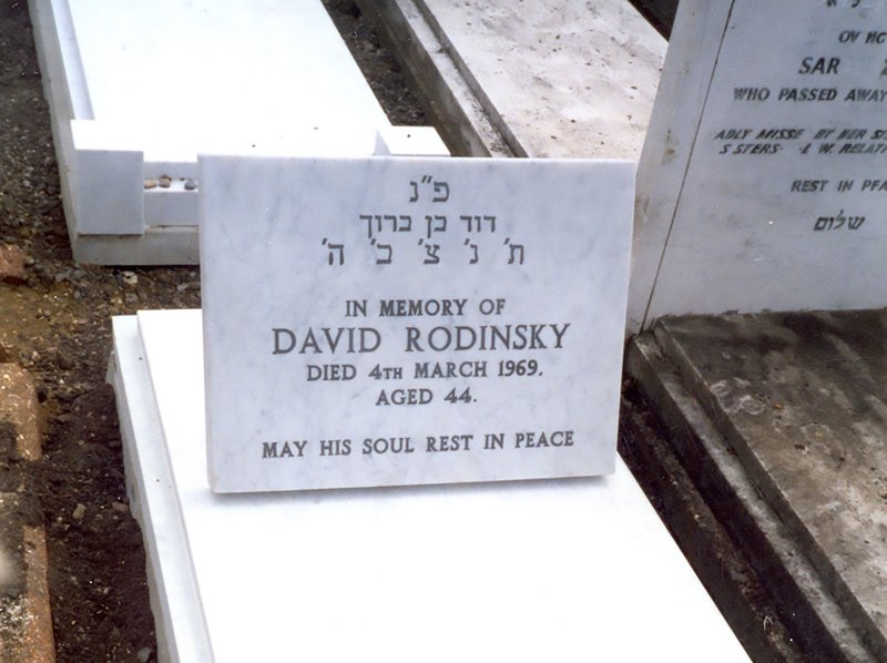Image: David Rondinsky's headstone, that Rachel Lichtenstein commissioned Elfes stonemasons to create, being laid in 1999. Photograph: Rachel Lichtenstein1999. Photograph: Rachel Lichtenstein