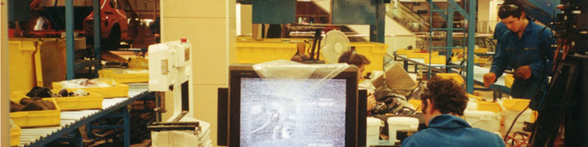 Operatives at work on the factory line, meticulously destroying Michael Landy's inventory during Break Down, 2001. Photograph: