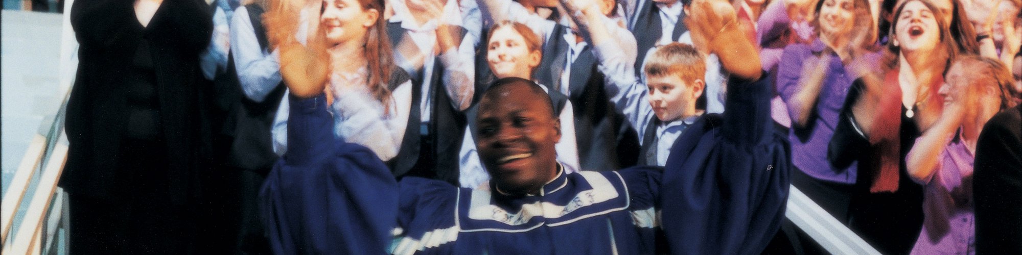 Image: The choirs perform during the Roundhouse performance of Because I Sing, 31 March, 2001. Photograph: Phil Lea