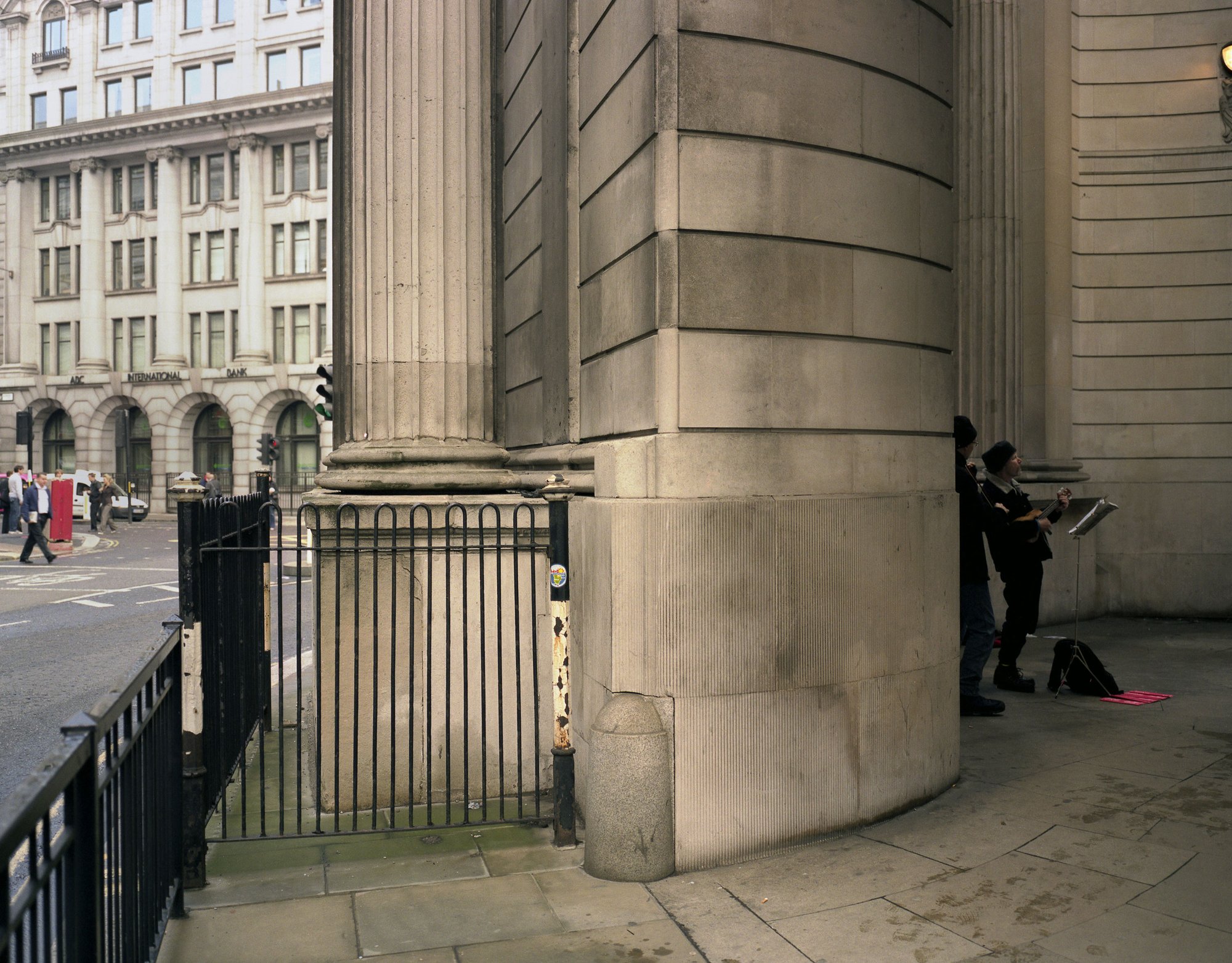 Performer Tim Flitcroft  playing Ballad of Accounting on ukulele and vocals with Chris Prosser on violin, part of Ruth Ewan: Did you kiss the foot that kicked you? (2007). Photograph: Gautier Deblonde