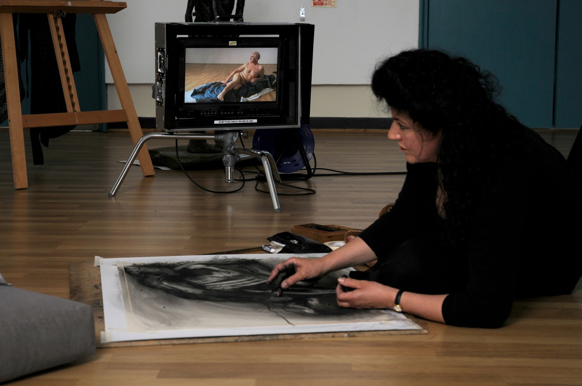 Still from Life Class: Today’s Nude, by artist Alan Kane, with tutor Judy Purbeck (2009).