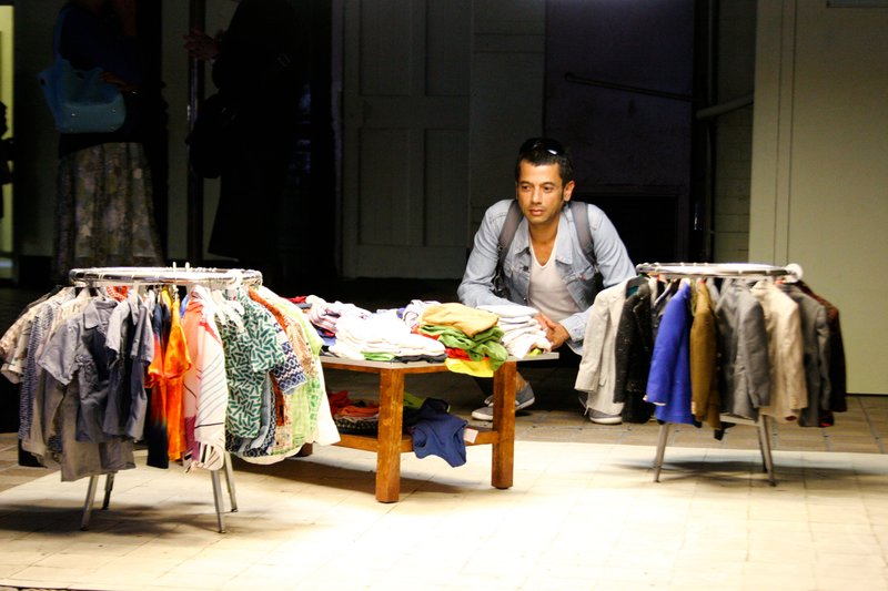 Visitor to opening event of Charles Ledray's Mens Suits, July 2009. Photograph: Tim Bowditch