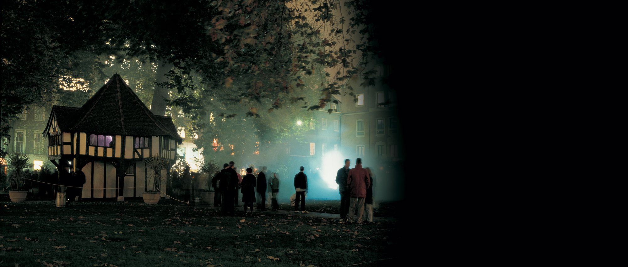 Image: Bystanders explore the projections within Soho Square during The Influence Machine, 2000. Photograph: Dennis Cowley