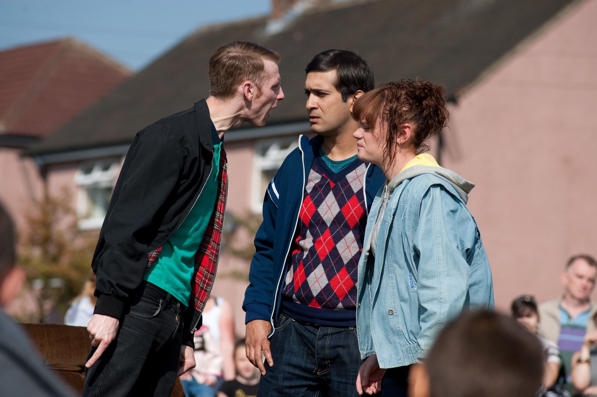 Production still: Scene from Andrea Dunbar’s play, ‘The Arbor’ performed on Brafferton Arbor. Characters include (from left to right); Young David (Robert Emms), Yousaf (Jimi Mistry), Girl (Natalie Gavin). Photograph: Nick Wall