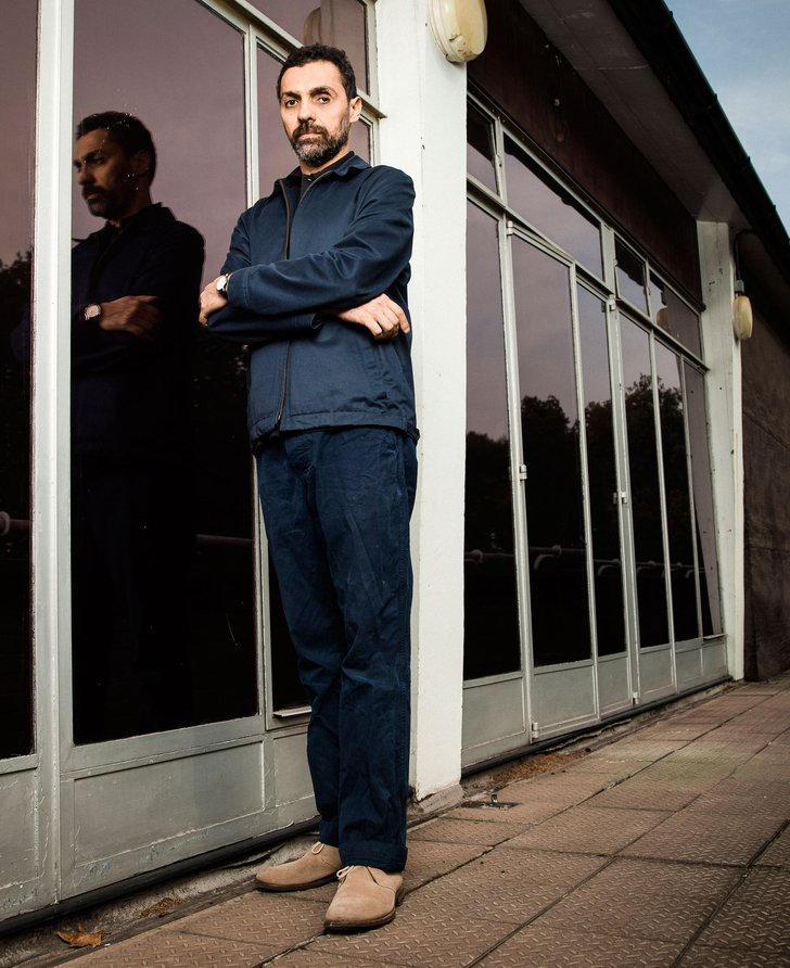 José Damasceno standing on the balcony on the 4th floor of Holborn Library during production of his project Plot (2014). Photograph: Tom Oldham