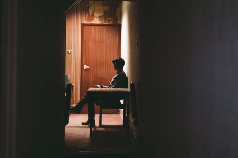 Person listening to End Matter, the Isle of Portland, April 2015. Photograph: Brendan Buesnel
