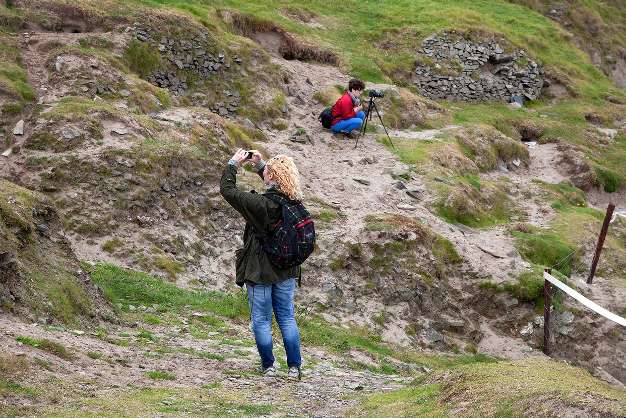 Image: Jessee Jones (left) and Sarah Browne (right) during fieldwork on the Blasket Islands (2014). Photograph: Enda Rowan