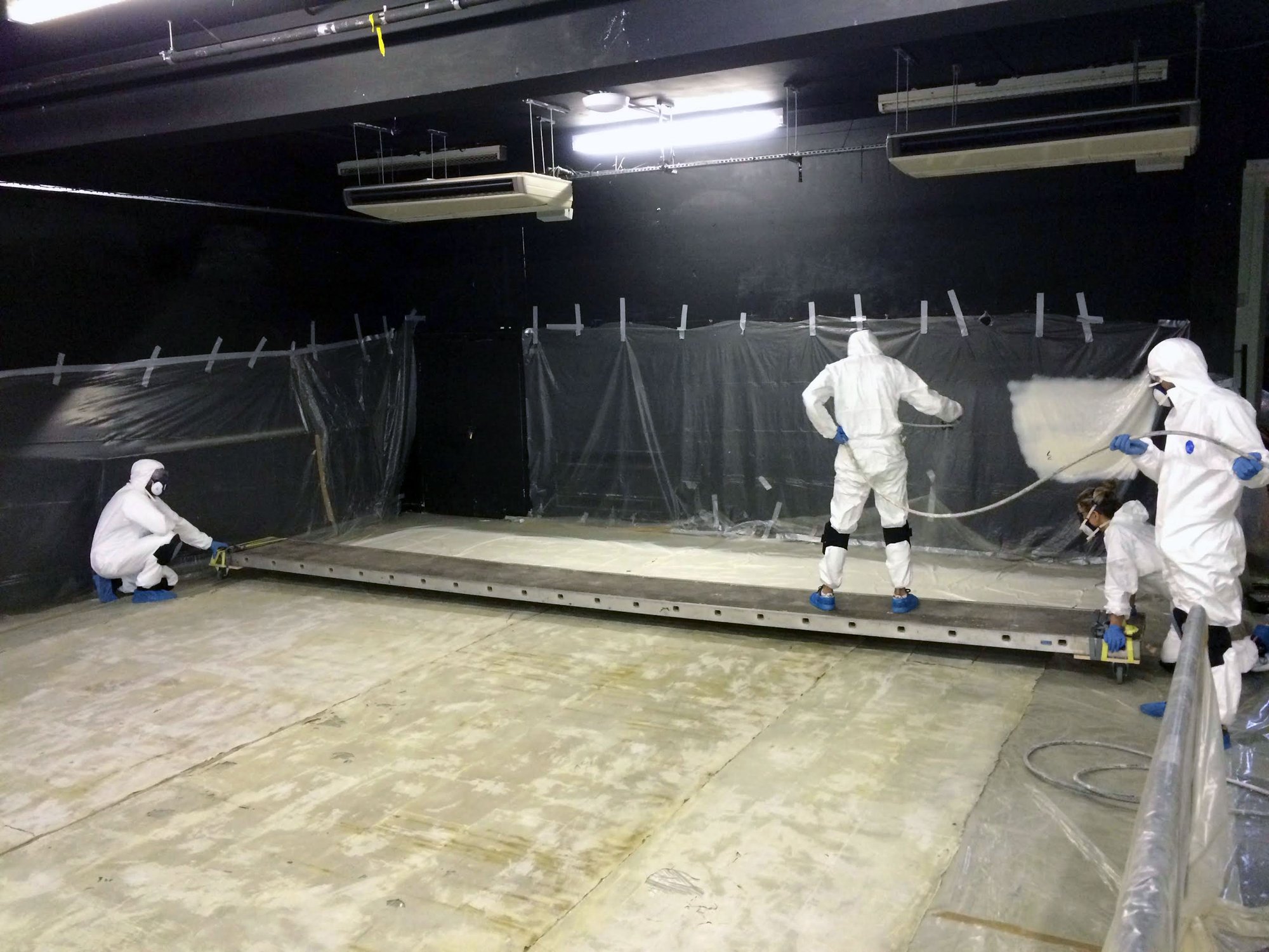 Jorge Otero-Pailos, John Robertson, Alice May Williams and Andrew Mealor  in the basement of The Rose Lipman Building, preparing The Ethics of Dust (2016). Photograph: Margarita Louca