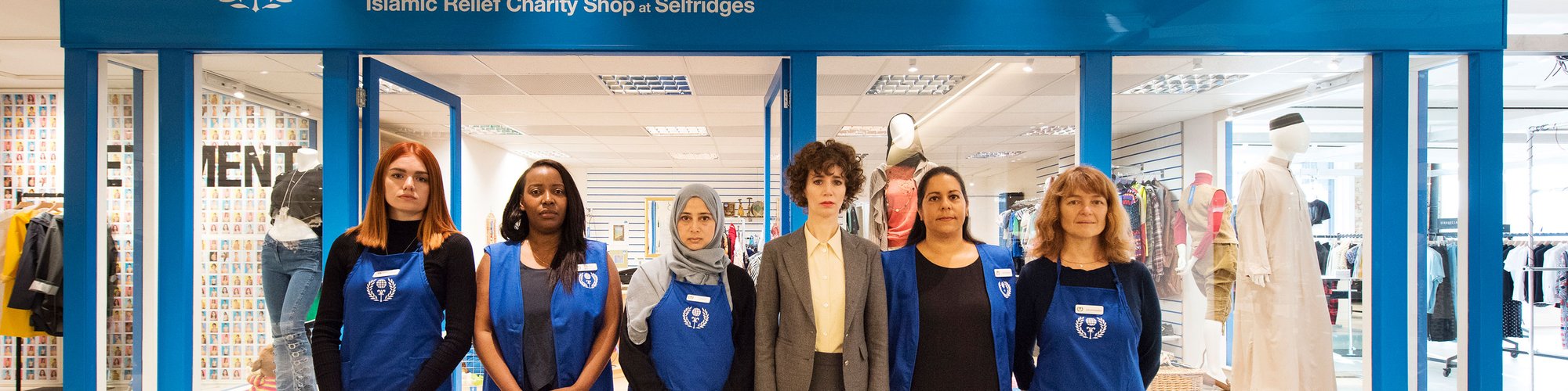 From left, Yasmin Wall, Diana Ngonyama, Latifa Rahman, Miranda July, Natasha Hodes and Abhayanandi outside Miranda July’s Interfaith Charity Shop, 31 August 2017. Photograph: Hugo Glendinning 