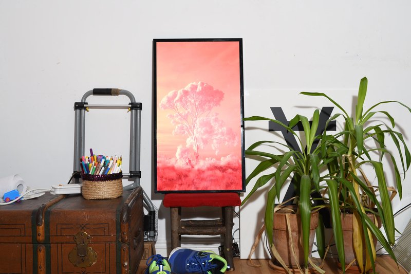 Red Lines displayed in a home next to plants and colouring pencils. Photograph: Tobias Faisst. Compositing: Tom Hadley